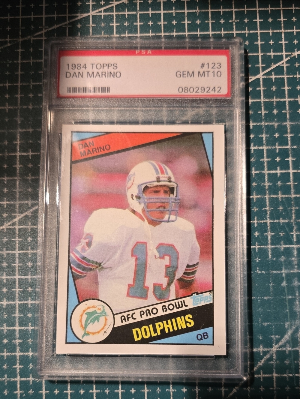 Topps Dolphins Football Card with Teal and Orange Accents